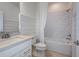 Clean bathroom with white subway tile and a shower/tub combo at 13730 Evergreen Valley Dr, Riverview, FL 33578