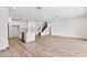 Open living space with kitchen and hardwood floors at 13728 Evergreen Valley Dr, Riverview, FL 33578