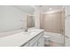 Clean bathroom with a bathtub, shower, and white countertop at 13728 Evergreen Valley Dr, Riverview, FL 33578