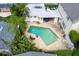 Aerial view showing home, pool, and backyard at 1229 S Roxmere Rd, Tampa, FL 33629