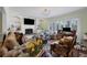 Living room with fireplace, built-ins, and a workspace at 1229 S Roxmere Rd, Tampa, FL 33629
