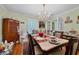 Elegant dining room with a formal table setting and hardwood floors at 1229 S Roxmere Rd, Tampa, FL 33629