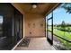 Relaxing screened porch overlooking a peaceful pond at 242 Shell Falls Dr, Apollo Beach, FL 33572