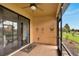 Screened porch with backyard and community views at 242 Shell Falls Dr, Apollo Beach, FL 33572