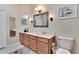 Light and bright bathroom with double vanity and a large mirror at 242 Shell Falls Dr, Apollo Beach, FL 33572