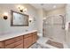 Bathroom with shower, toilet, and light vanity at 242 Shell Falls Dr, Apollo Beach, FL 33572