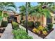 Landscaped walkway leading to the house entrance at 242 Shell Falls Dr, Apollo Beach, FL 33572
