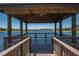 Serene lake view with gazebo and dock at 242 Shell Falls Dr, Apollo Beach, FL 33572