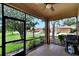 Screened porch with backyard and community views at 242 Shell Falls Dr, Apollo Beach, FL 33572