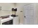 Convenient laundry room with Whirlpool washer and dryer at 242 Shell Falls Dr, Apollo Beach, FL 33572