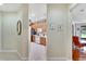 View of kitchen from hallway, showcasing modern design at 242 Shell Falls Dr, Apollo Beach, FL 33572