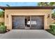 Attached garage with screen door and ample parking at 242 Shell Falls Dr, Apollo Beach, FL 33572
