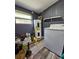 Laundry room with washer, dryer, and hot water heater at 10007 N 22Nd St, Tampa, FL 33612
