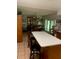 Kitchen features an island and eat-in area at 2705 Ranch Rd, Dover, FL 33527