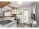 Modern kitchen with stainless steel appliances and granite countertops at 241 Skiff Pt # 4, Clearwater Beach, FL 33767