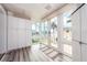 Sunroom with water views and built-in storage at 241 Skiff Pt # 4, Clearwater Beach, FL 33767