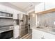 Updated kitchen with stainless steel appliances and granite countertops at 241 Skiff Pt # 4, Clearwater Beach, FL 33767