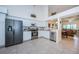 Kitchen with stainless steel appliances and white cabinets at 656 Spring Lake W Cir, Tarpon Springs, FL 34688