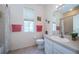 Clean bathroom with toilet, bathtub, and shower at 656 Spring Lake W Cir, Tarpon Springs, FL 34688