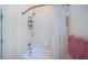 Simple bathroom with tub shower combo and updated fixtures at 656 Spring Lake W Cir, Tarpon Springs, FL 34688