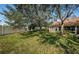 Spacious backyard, great for outdoor activities at 656 Spring Lake W Cir, Tarpon Springs, FL 34688