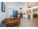 Open kitchen with breakfast nook and stainless steel appliances at 656 Spring Lake W Cir, Tarpon Springs, FL 34688