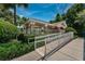 Community pool area with accessible entrance and seating at 656 Spring Lake W Cir, Tarpon Springs, FL 34688