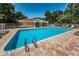 Community pool with lounge chairs and a 5ft depth at 656 Spring Lake W Cir, Tarpon Springs, FL 34688