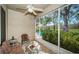 Spacious screened-in porch overlooking the backyard at 656 Spring Lake W Cir, Tarpon Springs, FL 34688