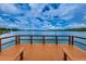 Enjoy breathtaking lake views from this peaceful, private wooden dock at 656 Spring Lake W Cir, Tarpon Springs, FL 34688