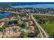 Community overview showcasing lakefront location and easy access to main roads at 656 Spring Lake W Cir, Tarpon Springs, FL 34688