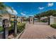 Gated entrance to community with intercom system at 656 Spring Lake W Cir, Tarpon Springs, FL 34688