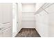 Walk-in closet with wire shelving and carpet flooring at 13720 Brookside Haven St, Riverview, FL 33578