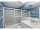 Clean bathroom with a shower/tub combo and white vanity at 1868 Shore S Dr # 207, South Pasadena, FL 33707