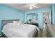 Spacious bedroom with a gray bed and mirrored closet doors at 1868 Shore S Dr # 207, South Pasadena, FL 33707