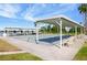 Shuffleboard courts with covered seating areas at 1868 Shore S Dr # 207, South Pasadena, FL 33707