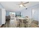 Condo dining area with view to living room at 1868 Shore S Dr # 207, South Pasadena, FL 33707