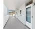 Building hallway with light blue door to unit 207 at 1868 Shore S Dr # 207, South Pasadena, FL 33707