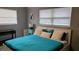 Spacious bedroom with a king-size bed and calming decor at 2392 Indigo Dr, Clearwater, FL 33763
