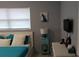 Bedroom with queen bed, nightstand and dresser at 2392 Indigo Dr, Clearwater, FL 33763