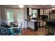 Charming kitchen with a breakfast nook and access to the backyard at 2392 Indigo Dr, Clearwater, FL 33763