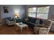 Relaxing living room with comfy seating and hardwood floors at 2392 Indigo Dr, Clearwater, FL 33763