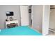 Bedroom with a queen bed and walk-in closet at 2392 Indigo Dr, Clearwater, FL 33763