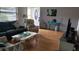Cozy living room featuring hardwood floors and comfortable seating at 2392 Indigo Dr, Clearwater, FL 33763