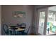 Bright dining area with table and chairs, and access to backyard patio at 2392 Indigo Dr, Clearwater, FL 33763