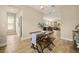 Small dining area with rustic wooden table and chairs, located near the kitchen at 1407 7Th N Ave, St Petersburg, FL 33705