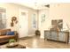 Bright entryway with hardwood floors and stylish console table at 1407 7Th N Ave, St Petersburg, FL 33705