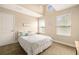 Bright bedroom featuring a comfortable bed and large windows at 1407 7Th N Ave, St Petersburg, FL 33705