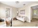 Well lit home office space with built-in shelving and a comfortable sofa at 1407 7Th N Ave, St Petersburg, FL 33705