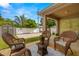 Fenced backyard with a storage shed and a spacious patio area at 1407 7Th N Ave, St Petersburg, FL 33705